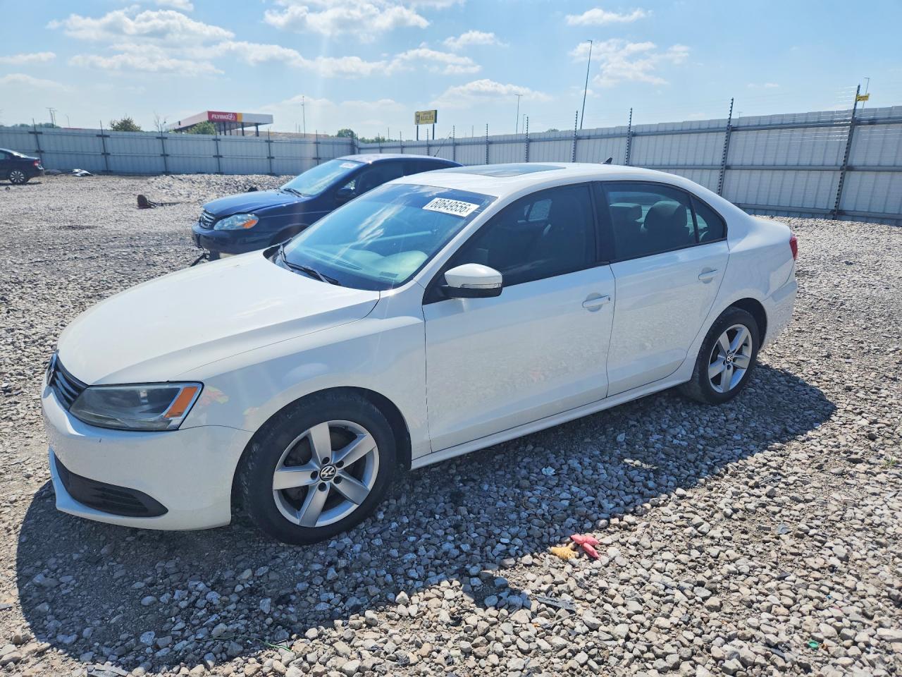 2012 Volkswagen Jetta TDI, VIN 3VWLL7AJ5CM377555 — Side