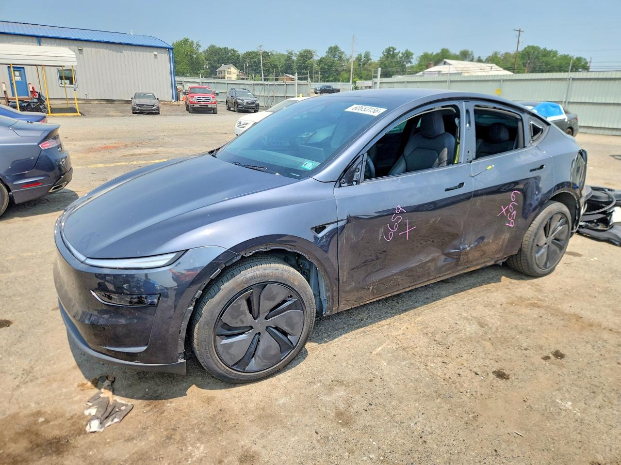 2026 Tesla Model Y Long Range Launch Series, VIN 7SAYGDEE7TF345271 — Side