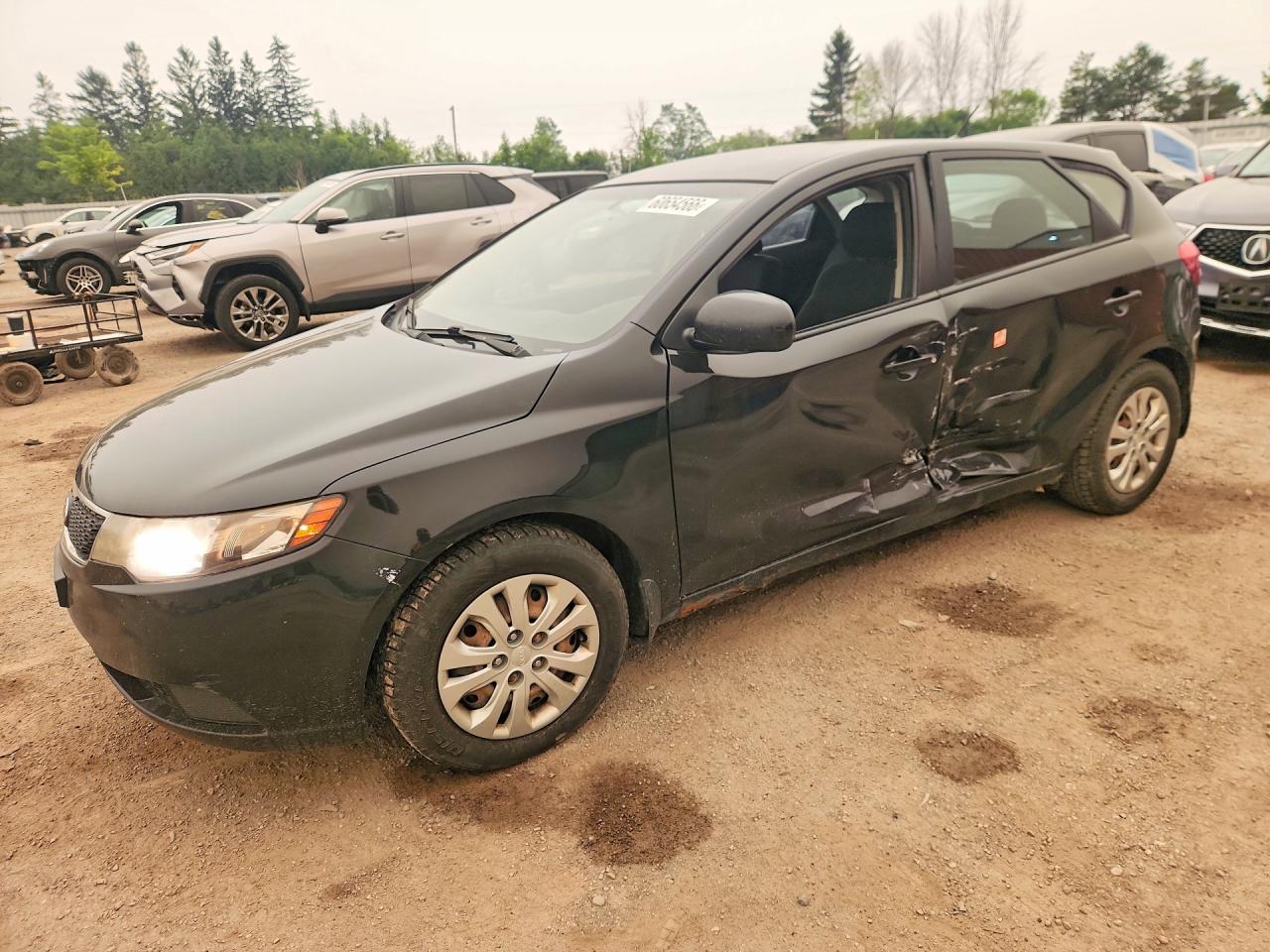 2013 Kia Forte, VIN KNAFT5A29D5670232 — Бок