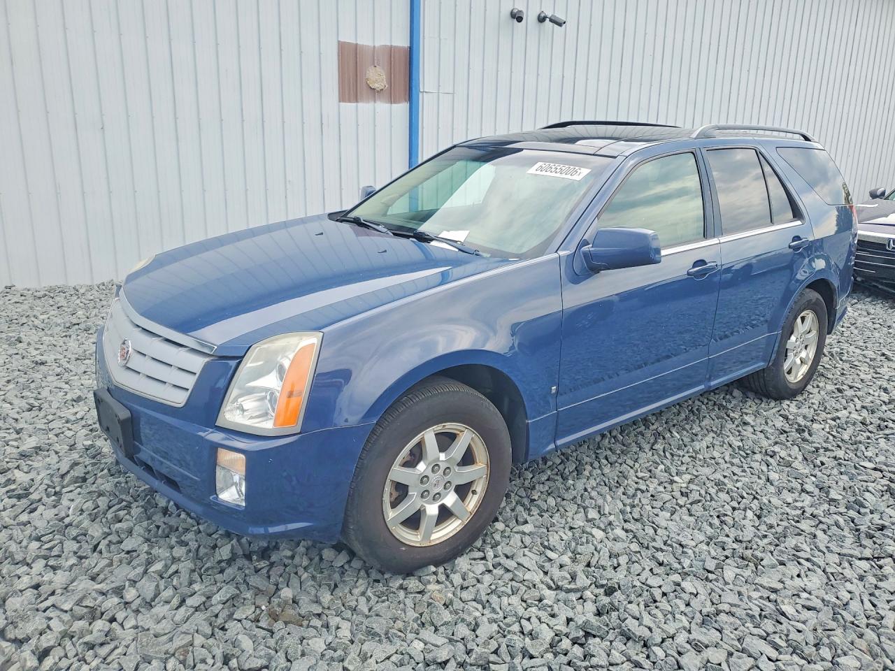 2009 Cadillac SRX AWD, VIN 1GYEE437590128457 — Механическое