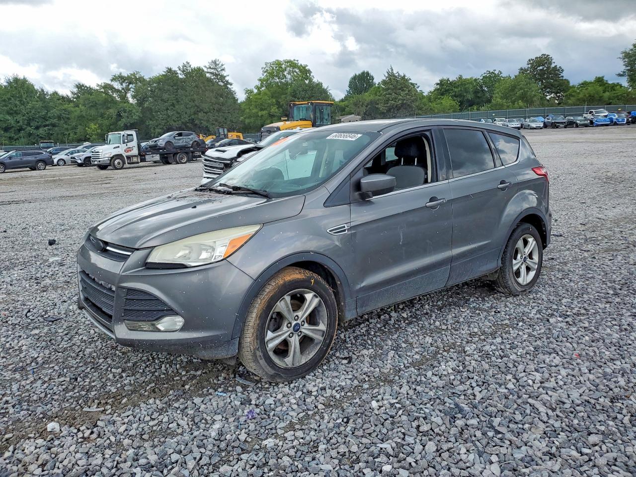 2014 Ford Escape SE, VIN 1FMCU0GX1EUD64752 — Engine fire