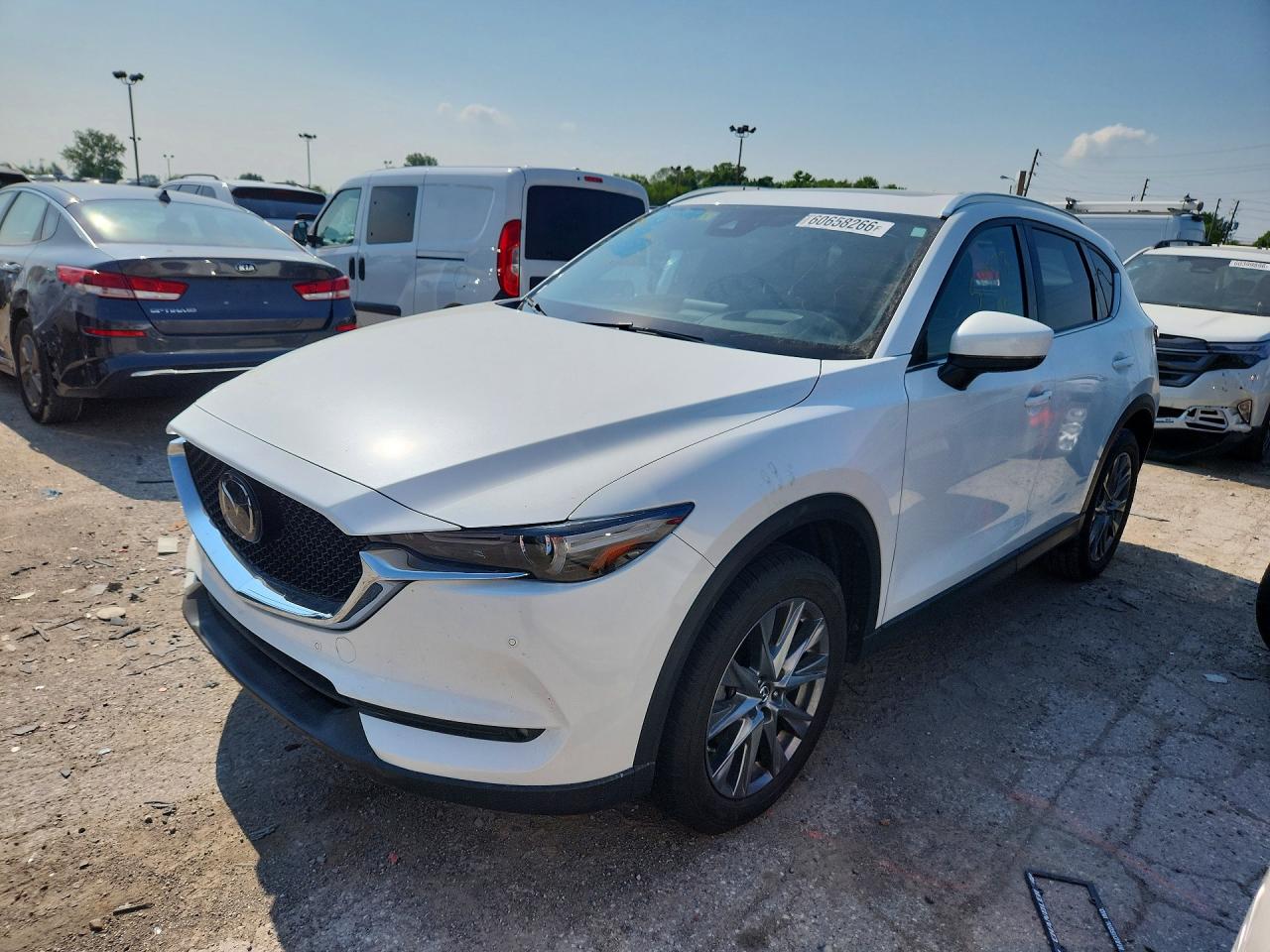 2019 Mazda CX-5 Signature, VIN JM3KFBEY9K0519933 — Rear end