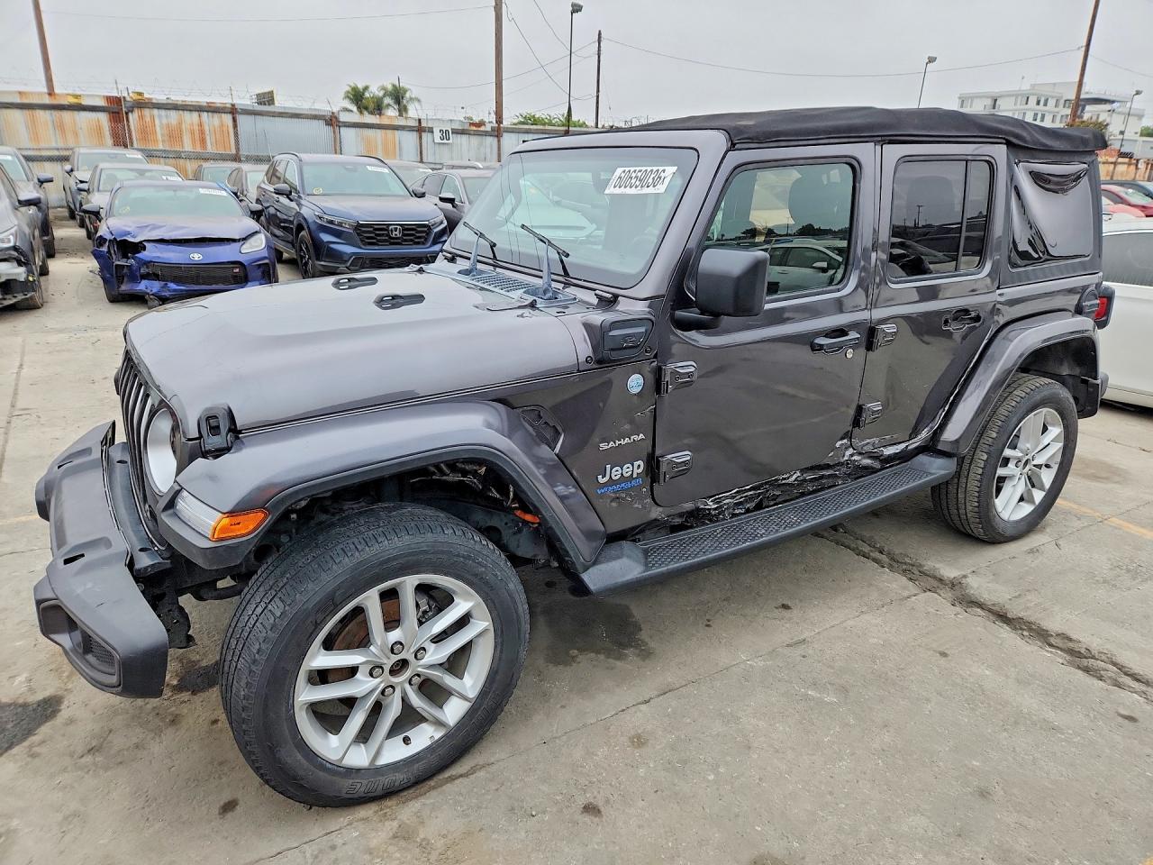 2021 Jeep Wrangler Unlimited Sahara, VIN 1C4JJXP65MW749934 — Side