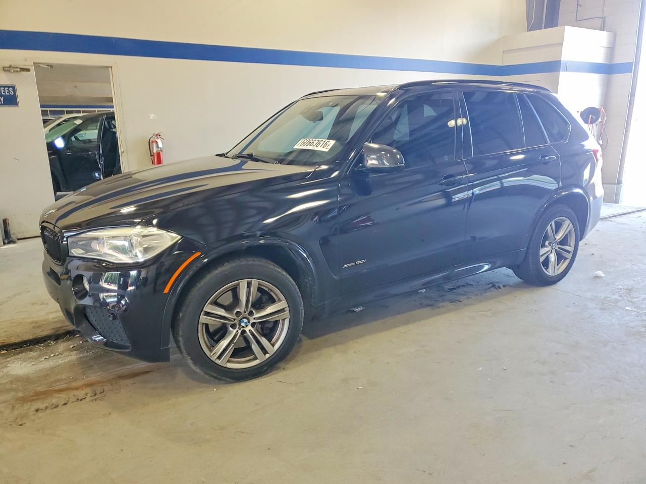 2016 BMW X5 xDrive50i, VIN 5UXKR6C54G0J82643 — Water / flood