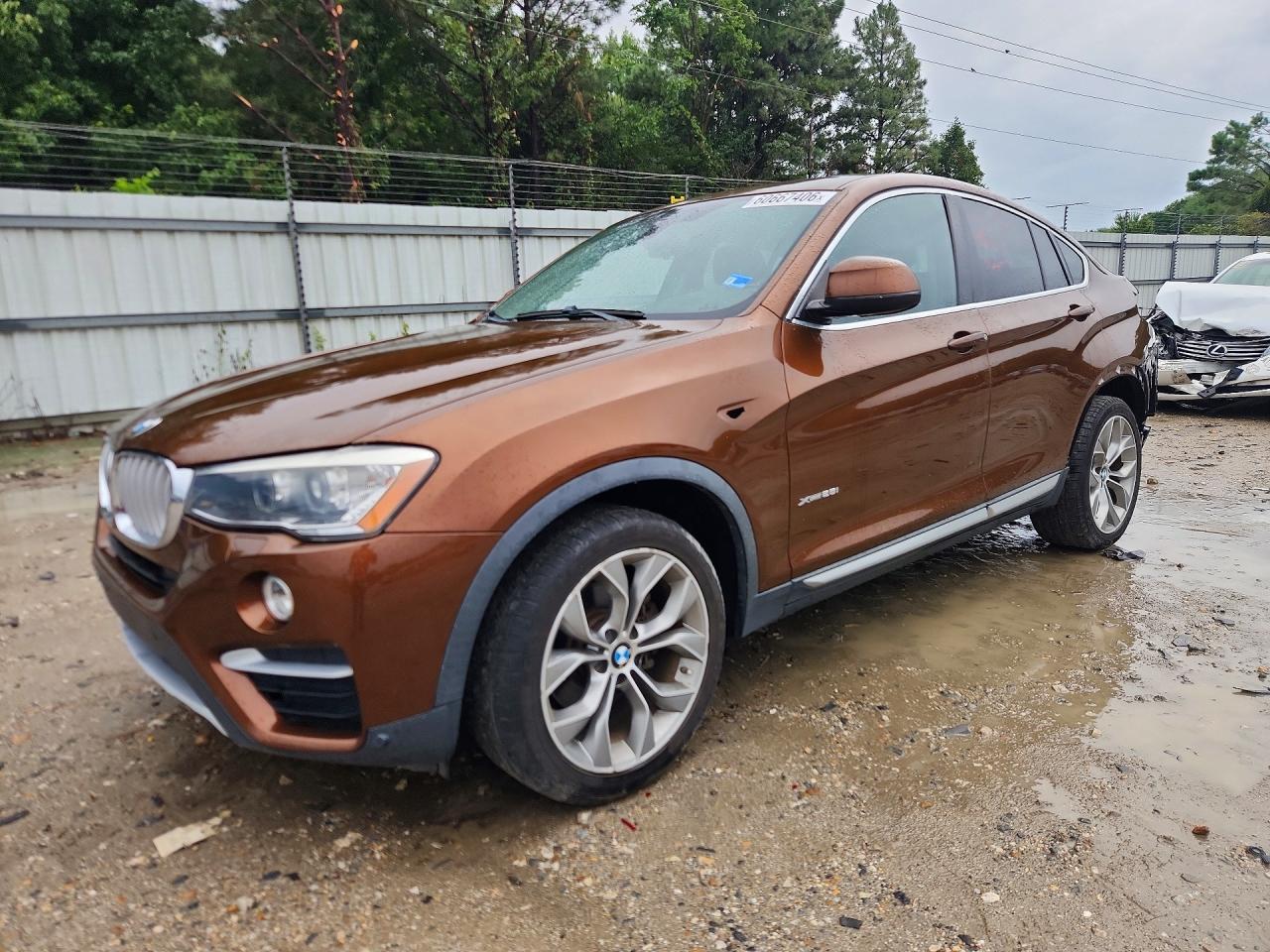 2017 BMW X4 xDrive28i, VIN 5UXXW3C34H0T79308 — Rear end