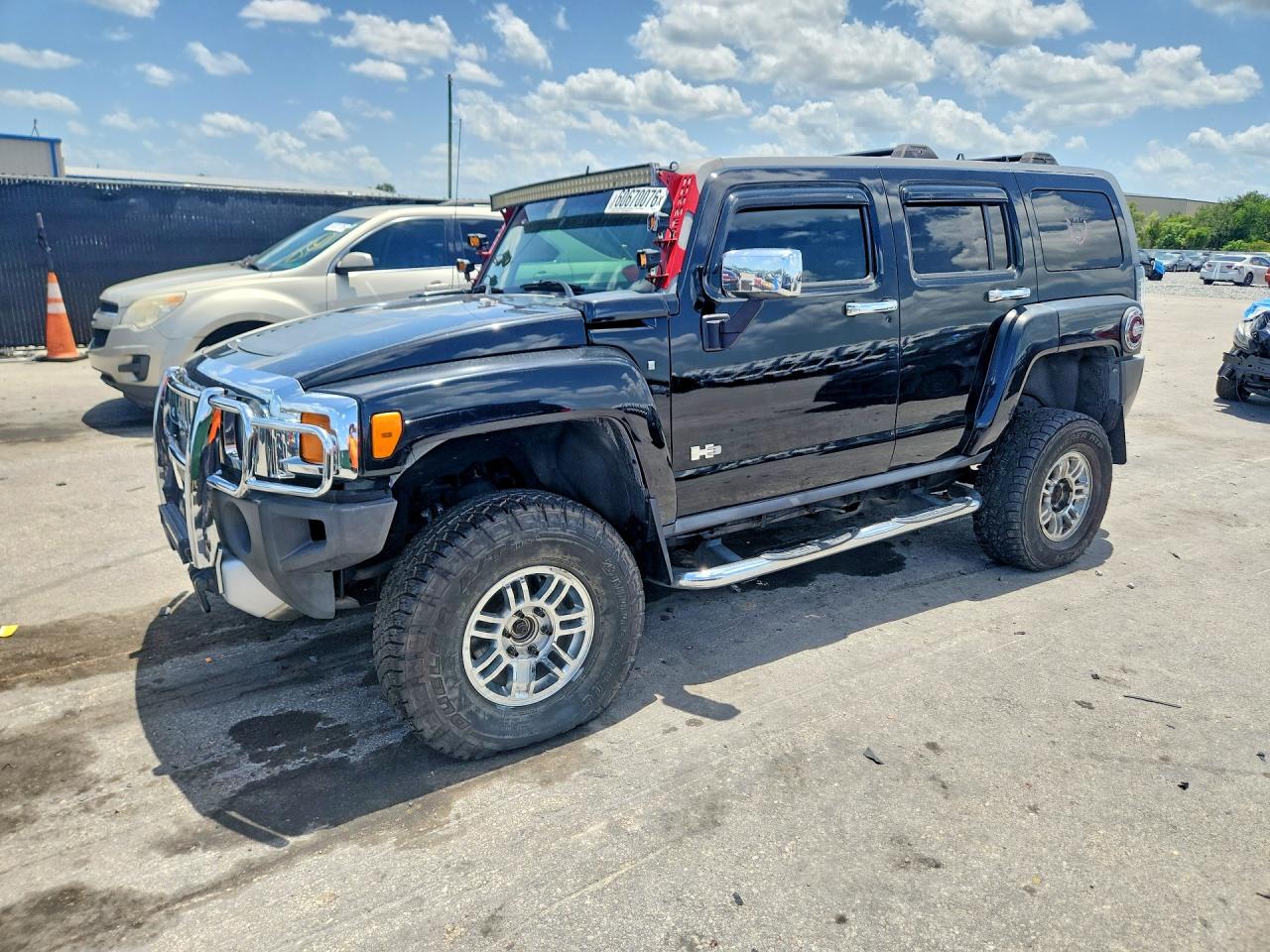 2009 Hummer H3 SUV, VIN 5GTEN13E898143175 — Rear end