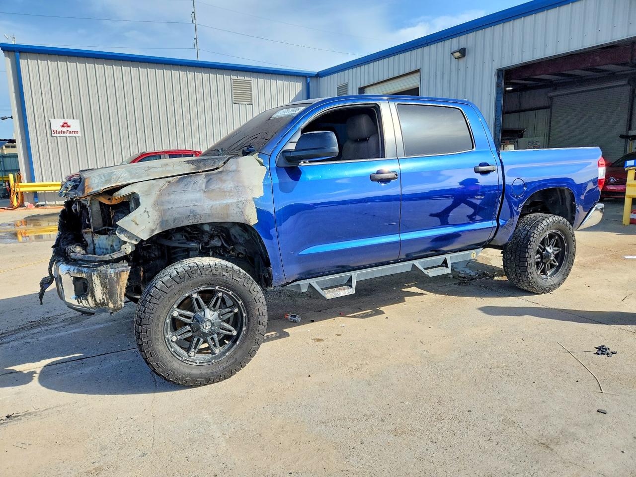 2014 Toyota Tundra SR5, VIN 5TFEY5F12EX159063 — Engine fire