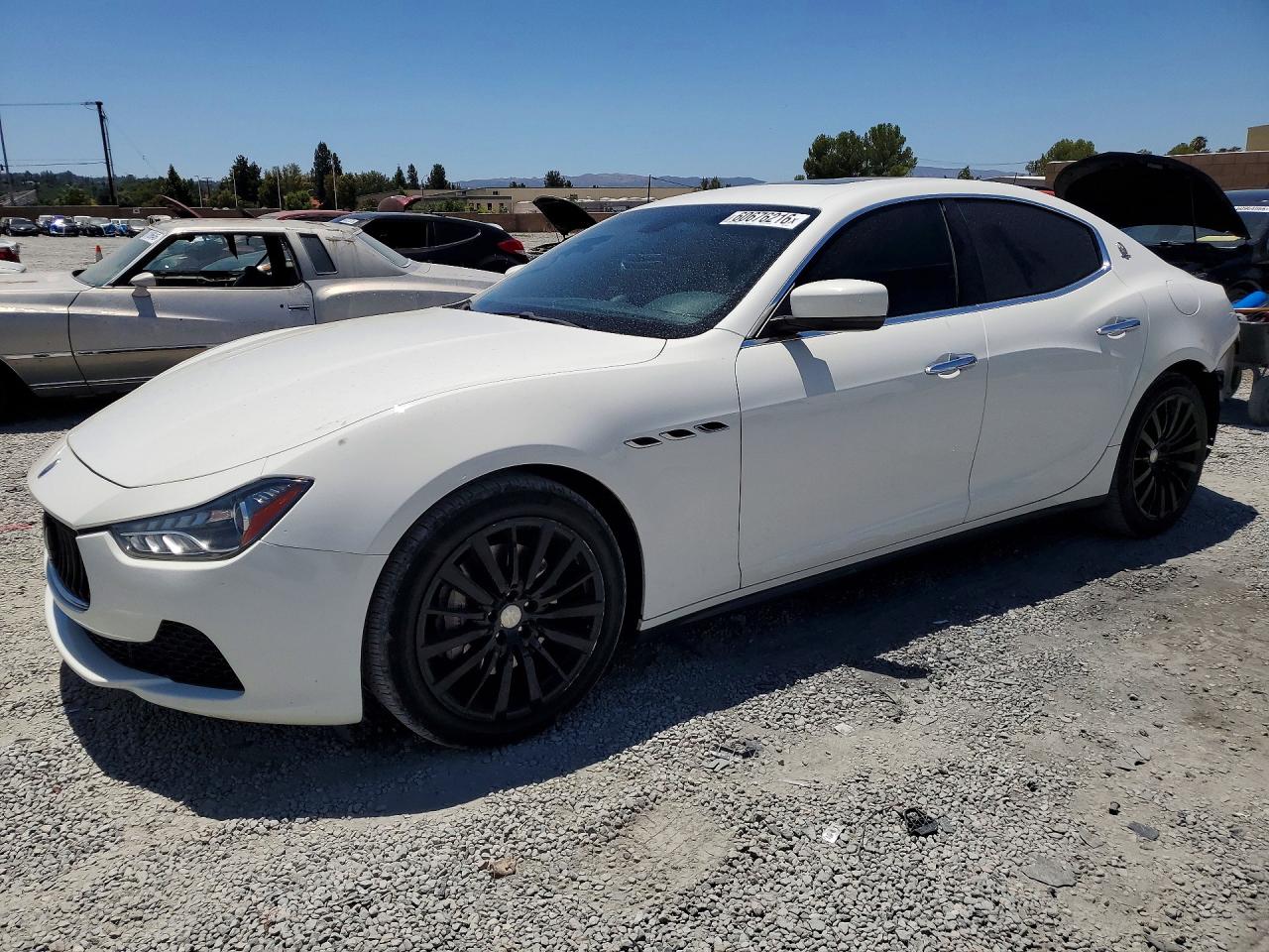 2016 Maserati Ghibli, VIN ZAM57XSA2G1167816 — Зад