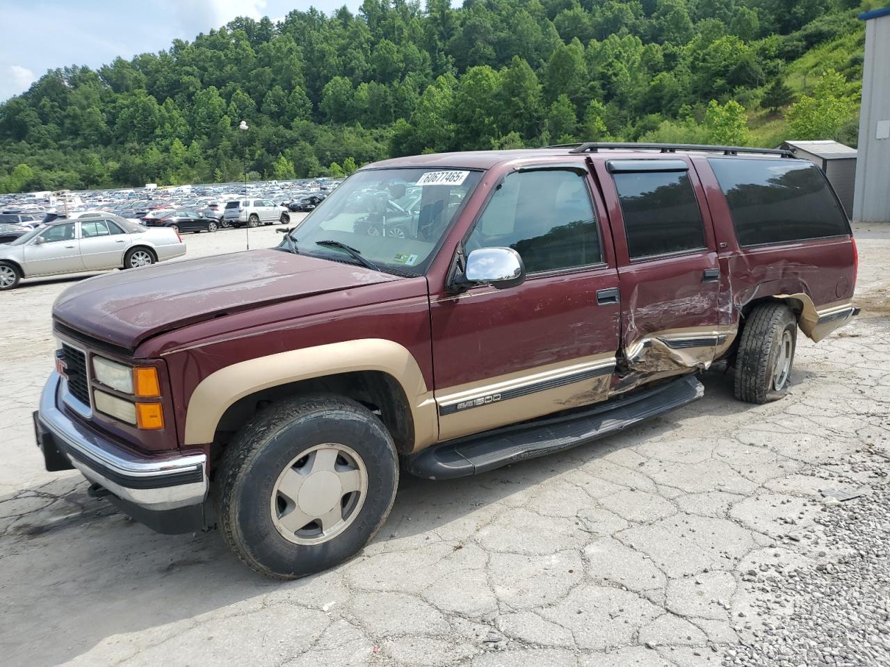 1999 GMC Suburban, VIN 1GKFK16R3XJ761646 — Side