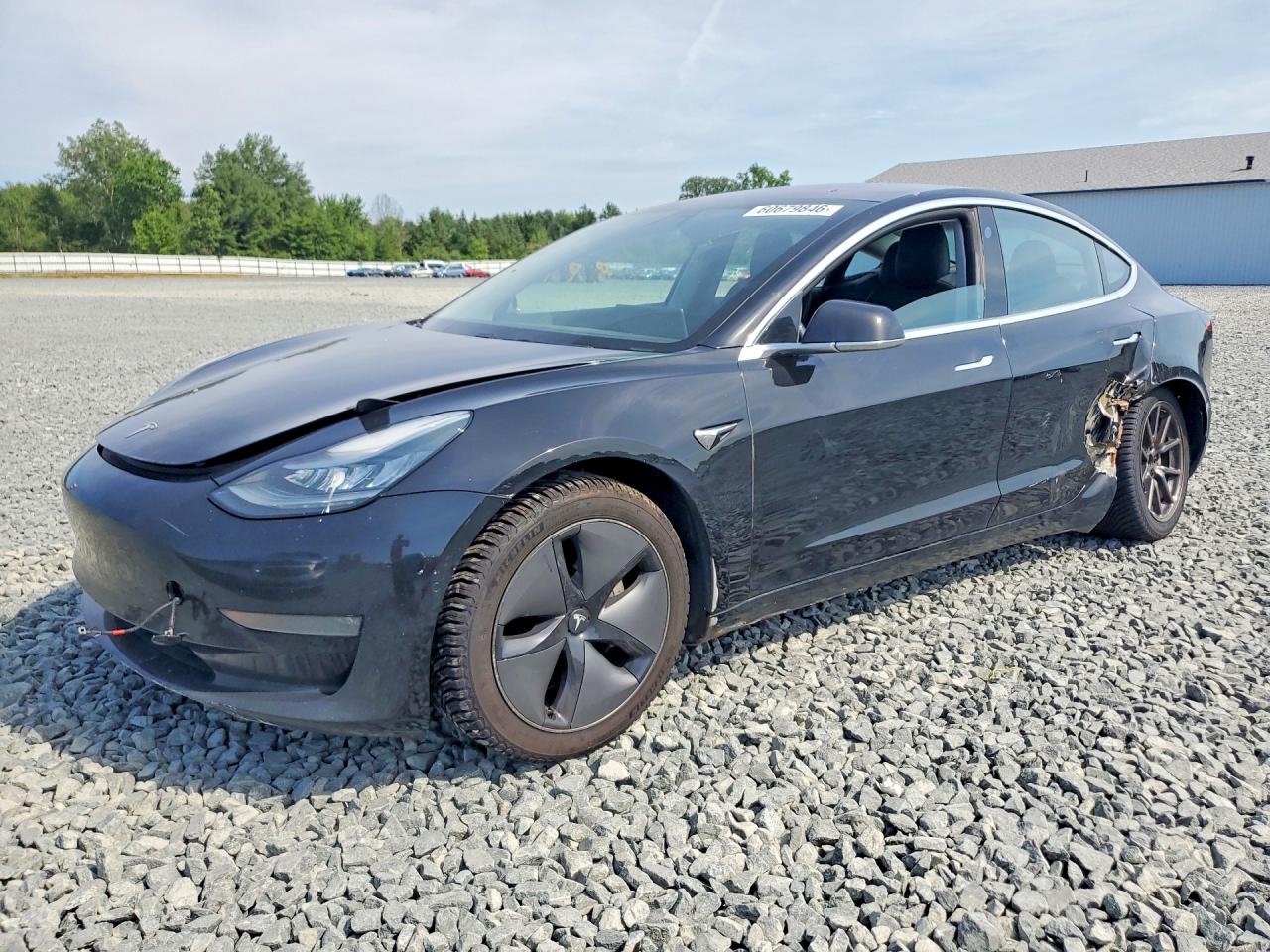 2018 Tesla Model 3 Long Range Battery, VIN 5YJ3E1EB0JF127252 — Side