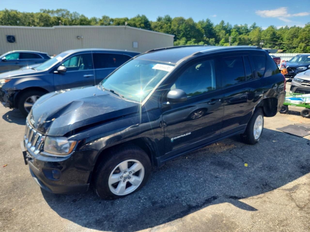 2015 Jeep Compass Altitude, VIN 1C4NJCBA2FD436716 — Зад