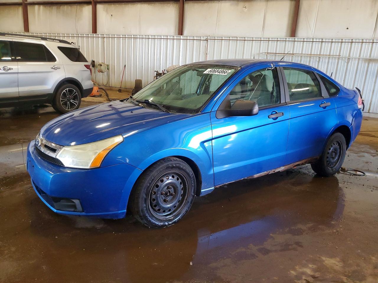 2011 Ford Focus S, VIN 1FAHP3EN0BW145596 — Front end