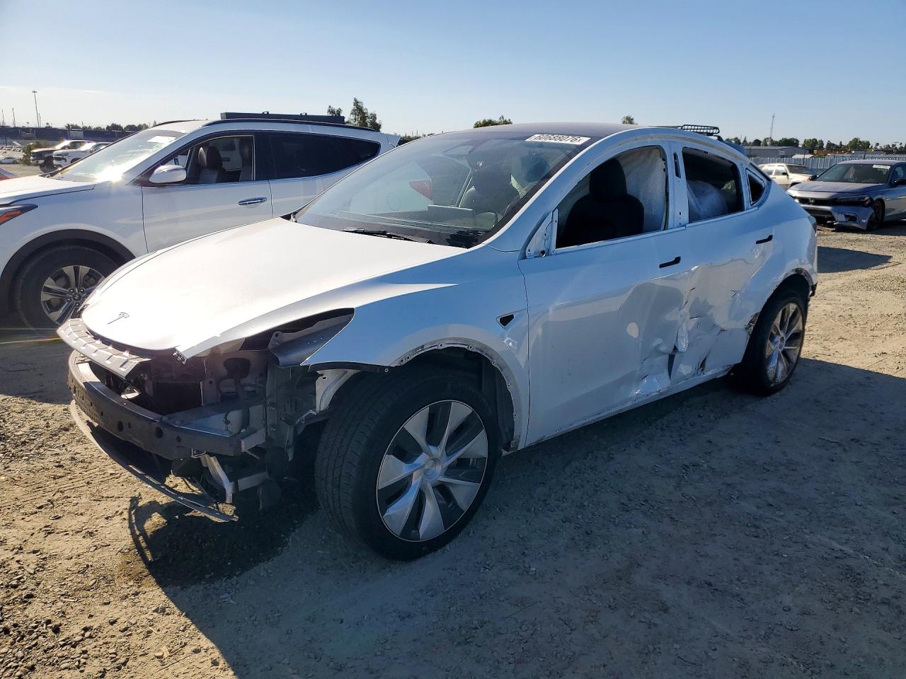 2024 Tesla Model Y, VIN 7SAYGDED0RF055177 — All over