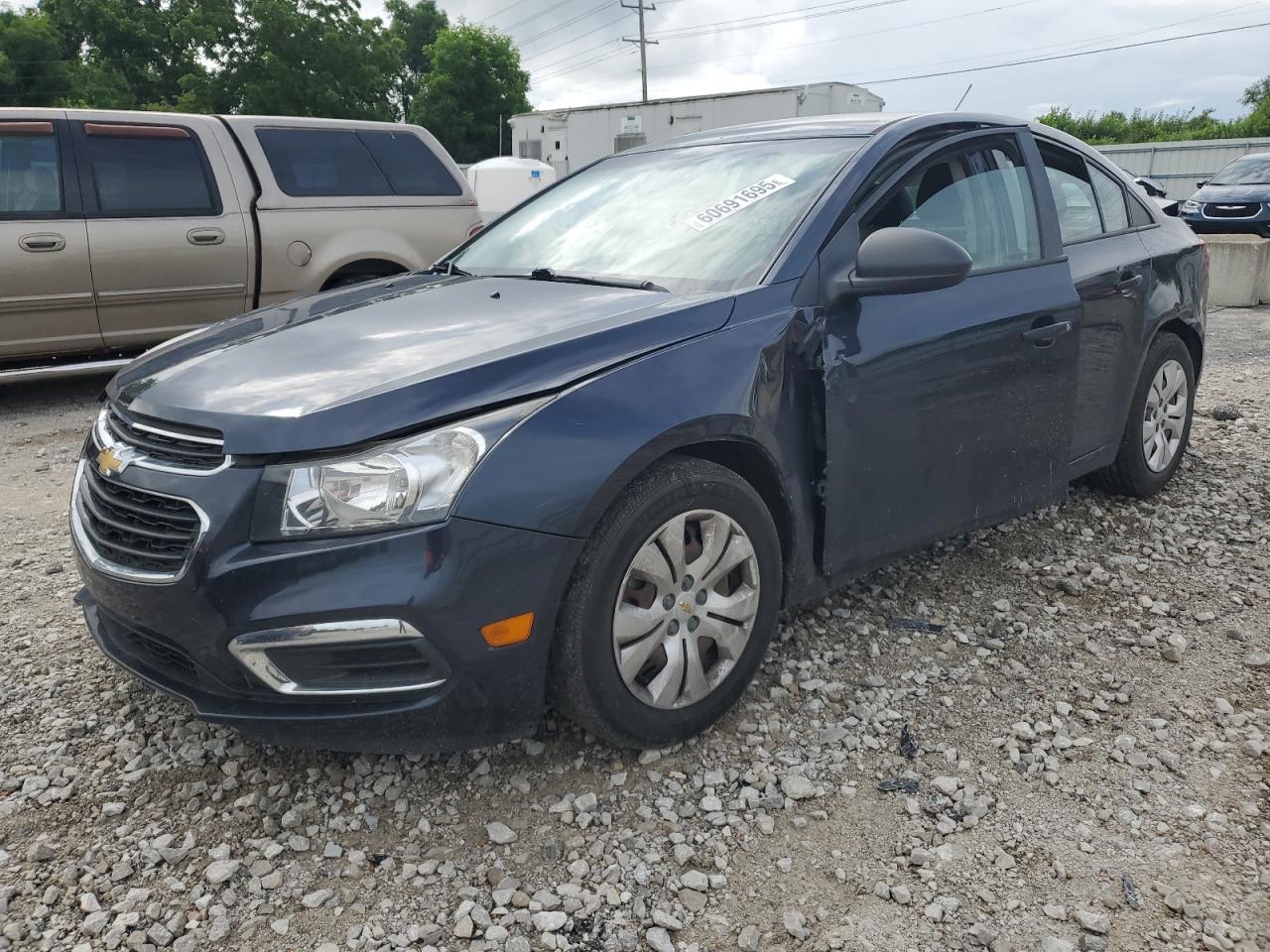 2016 Chevrolet Cruze LS, VIN 1G1PC5SH7G7209848 — Side