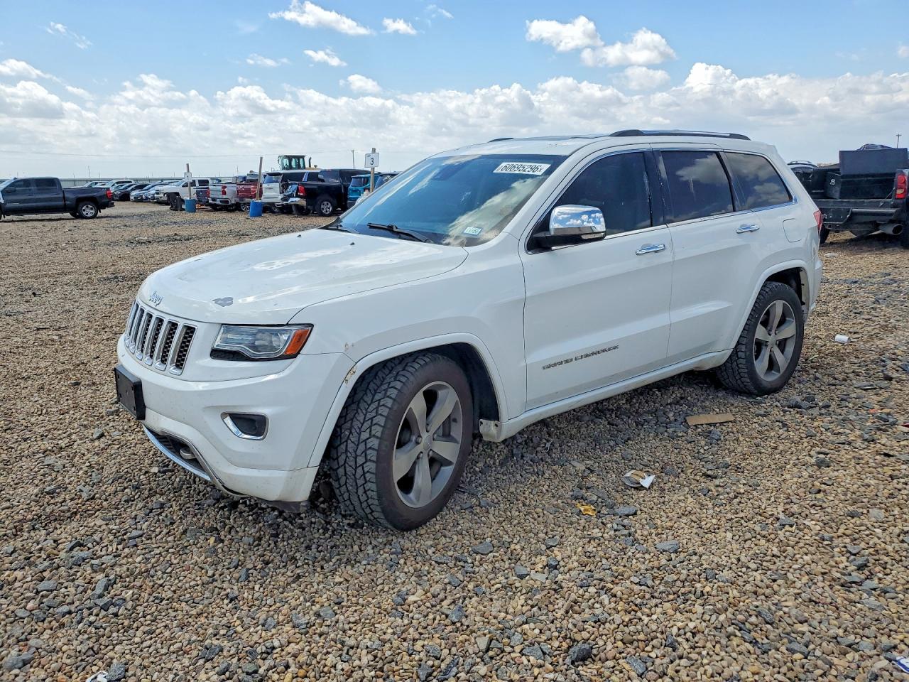 2014 Jeep Grand Cherokee Overland, VIN 1C4RJFCG3EC272998 — Hail