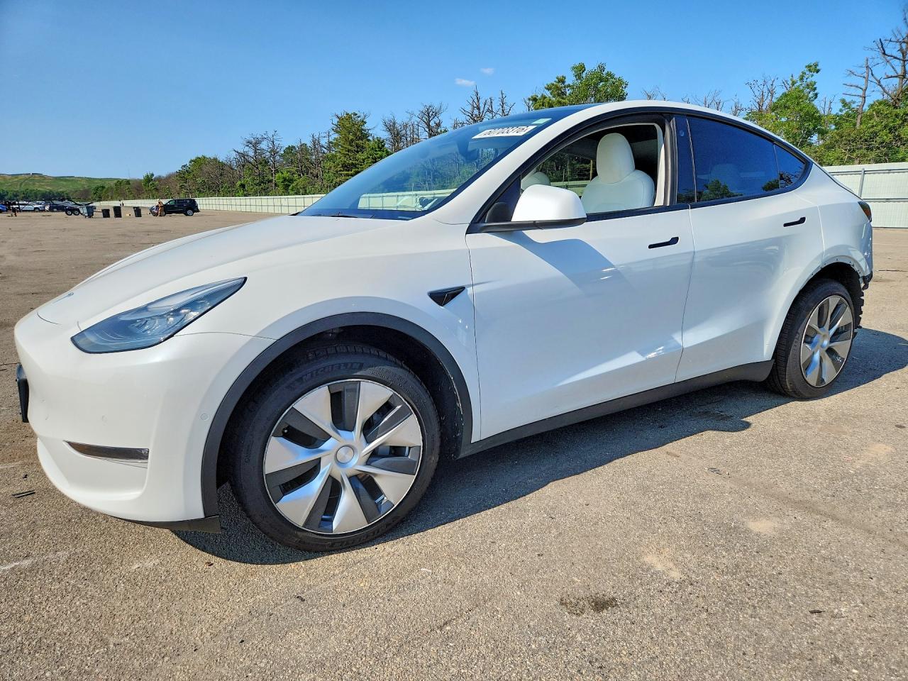 2021 Tesla Model Y Long Range, VIN 5YJYGDEE1MF130855 — Rear end