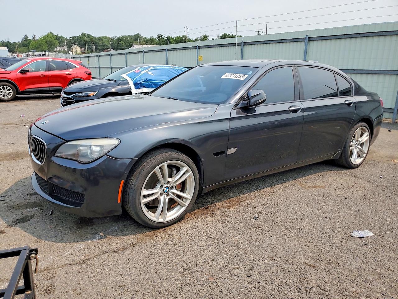 2013 BMW 7 Series 740Li, VIN WBAYE4C58DD136987 — Minor dents and scratches