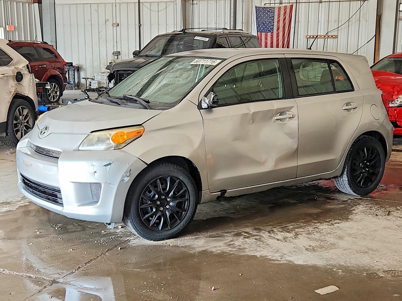 2010 Scion xD, VIN JTKKU4B43AJ057396 — Side
