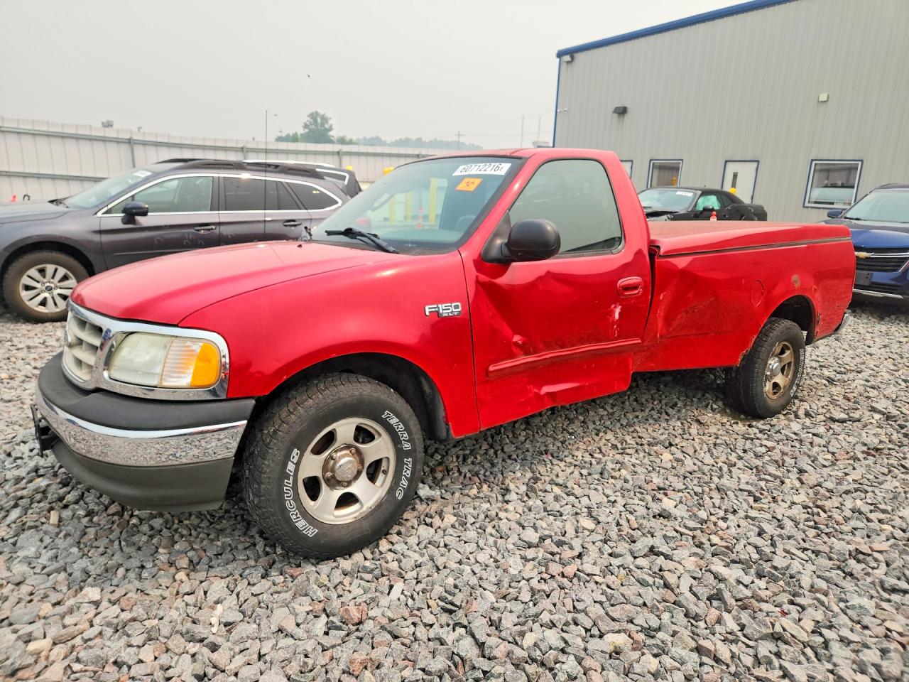 2003 Ford F-150 XL, VIN 2FTRF17213CA58814 — Бок