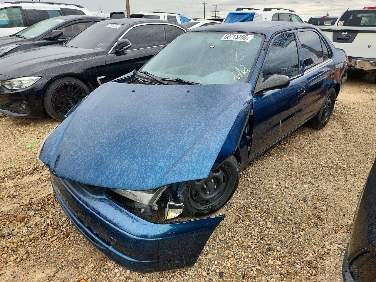 2000 Toyota Corolla CE, VIN 1NXBR12E8YZ349002 — Front end