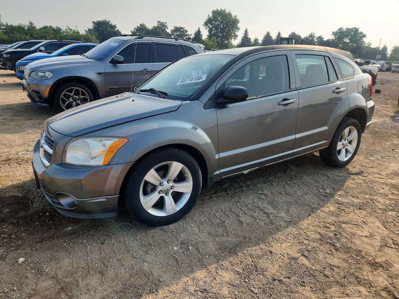 2011 Dodge Caliber Mainstreet, VIN 1B3CB3HA9BD295036 — Side