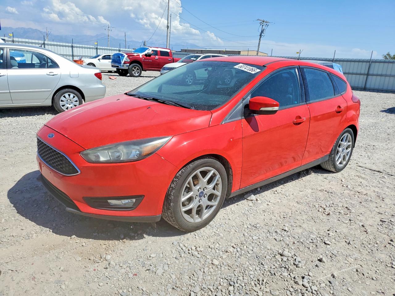 2015 Ford Focus SE, VIN 1FADP3K23FL255851 — Side