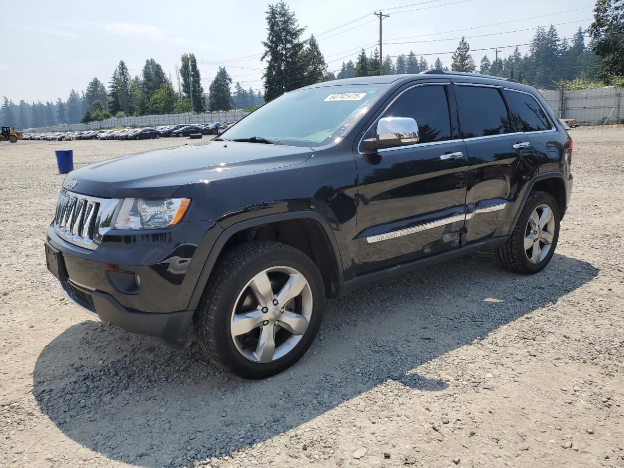 2013 Jeep Grand Cherokee Overland, VIN 1C4RJFCG0DC594030 — Side