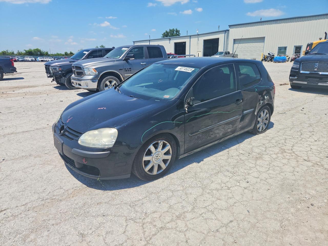 2009 Volkswagen Rabbit S, VIN WVWAB71KX9W135682 — Side