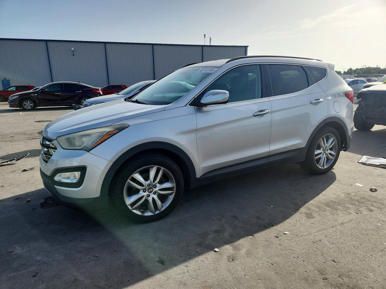 2013 Hyundai Santa Fe Sport, VIN 5XYZU3LA2DG084730 — Зад