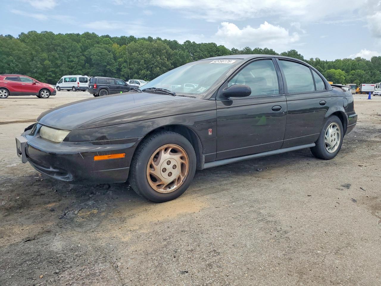 1997 Saturn SL, VIN 1G8ZJ5277VZ266625 — Front end
