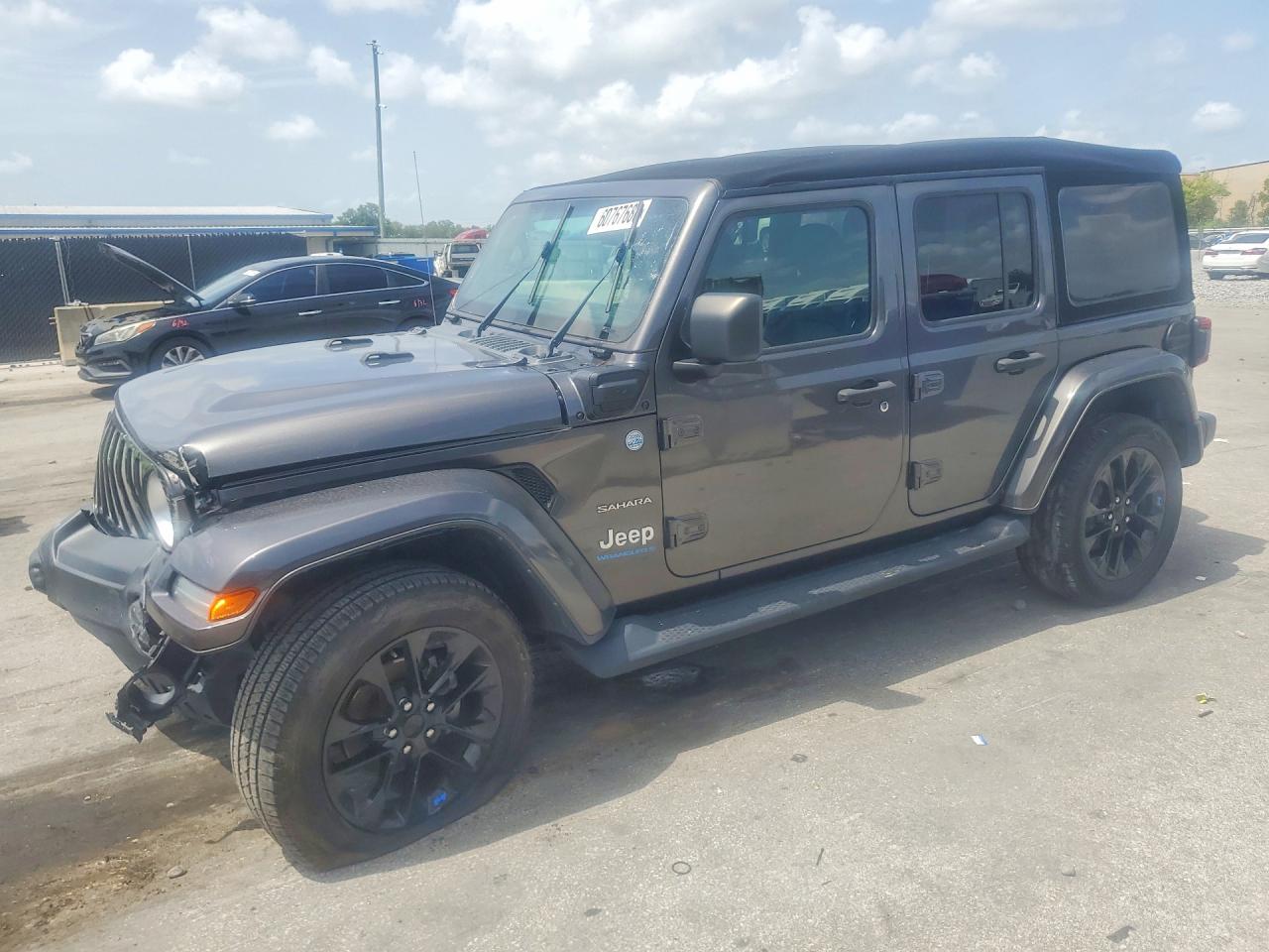 2023 Jeep Wrangler Sahara, VIN 1C4JJXP61PW581133 — Front end
