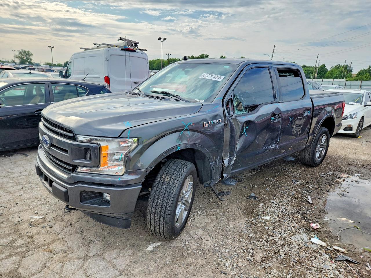 2019 Ford F-150 Lariat, VIN 1FTEW1E42KFD12729 — Side