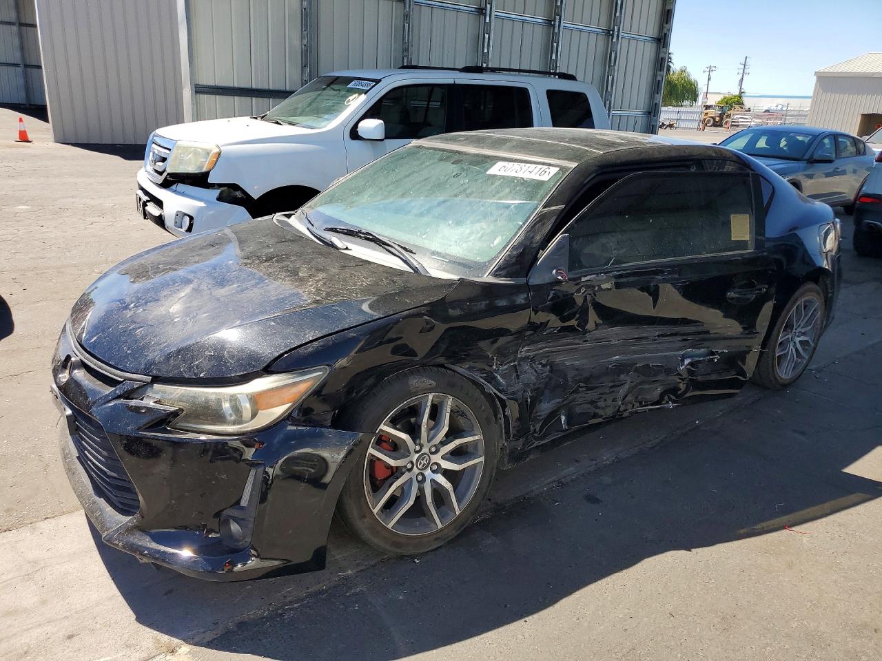 2014 Scion tC, VIN JTKJF5C70E3076776 — Side