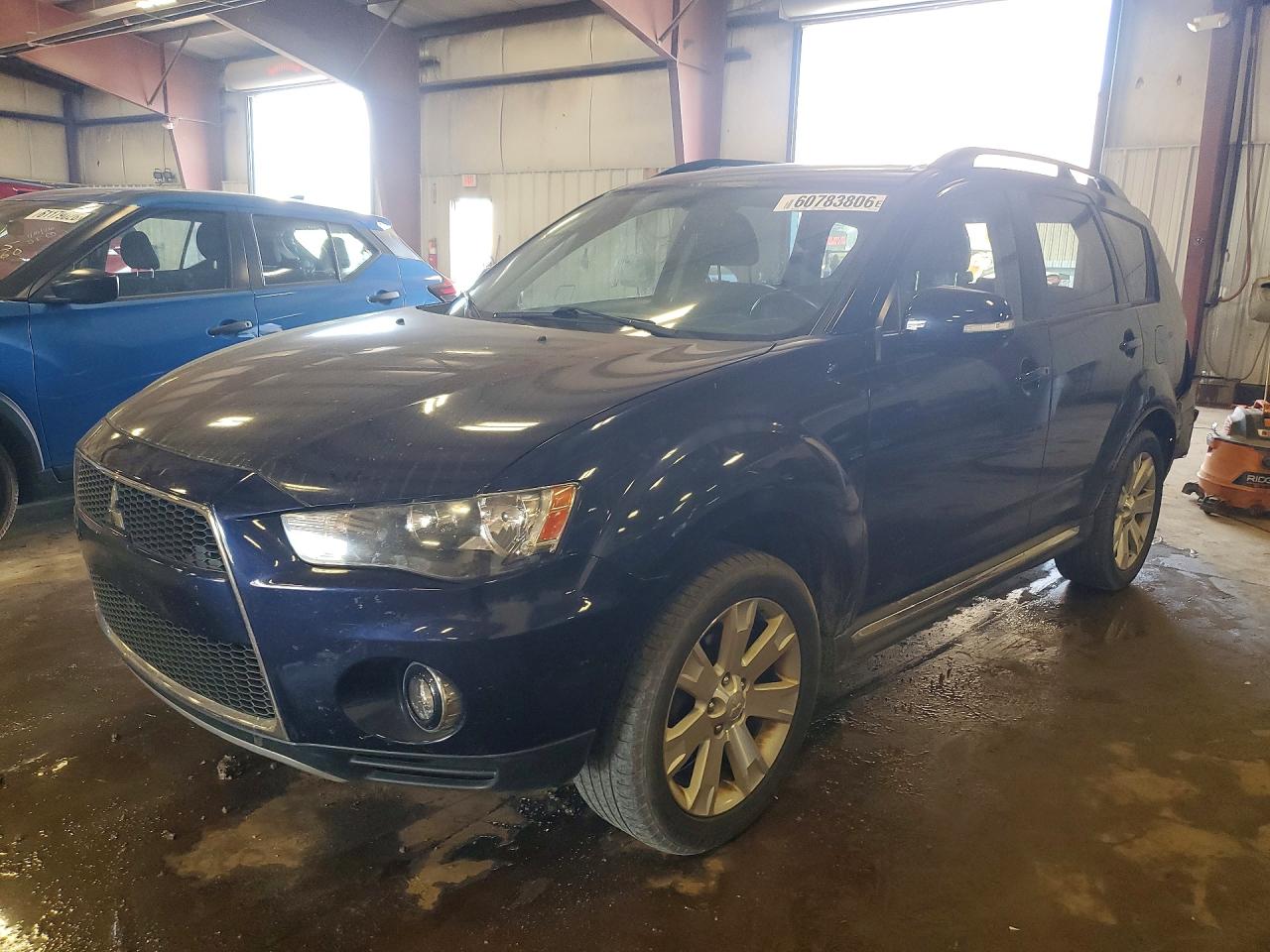 2010 Mitsubishi Outlander SE, VIN JA4JT3AW7AZ015196 — Зад