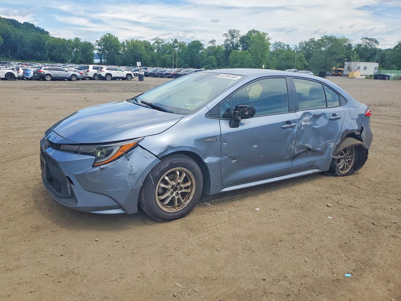 2021 Toyota Corolla Hybrid LE, VIN JTDEAMDE7MJ015482 — Side