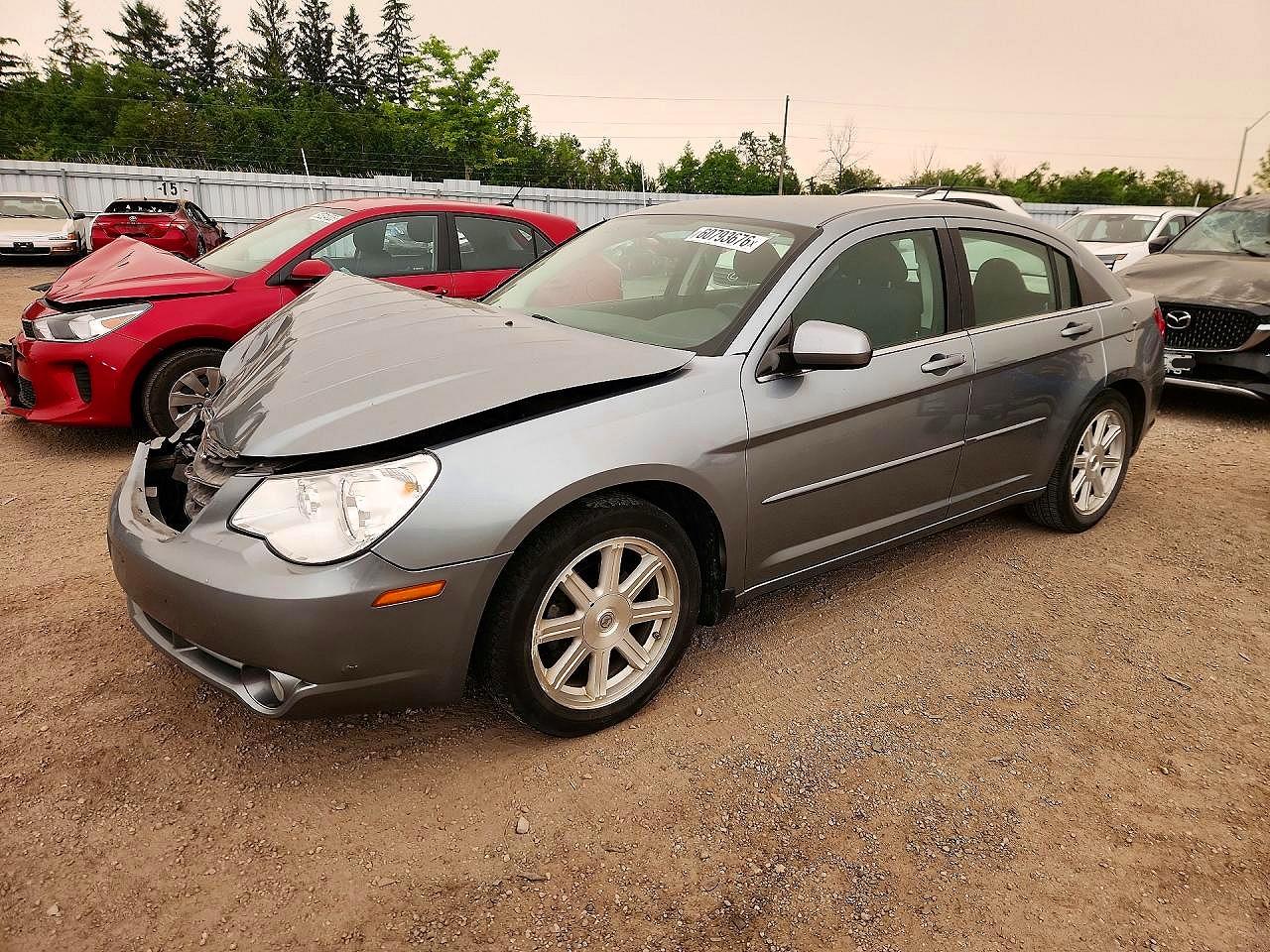 2009 Chrysler Sebring Touring, VIN 1C3LC56D79N536136 — Front end