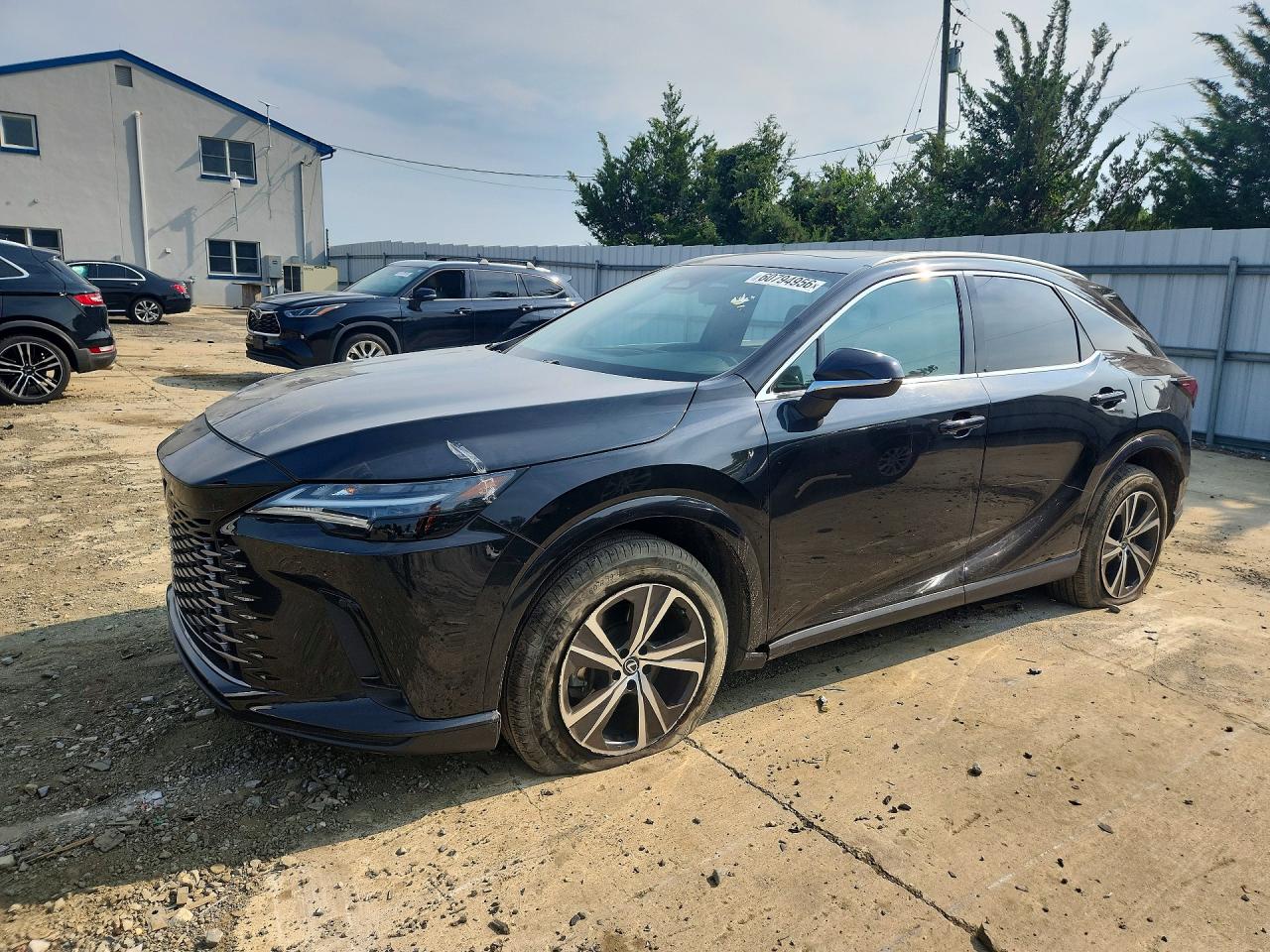 2023 Lexus RX 350 Premium, VIN 2T2BAMCAXPC015036 — Side