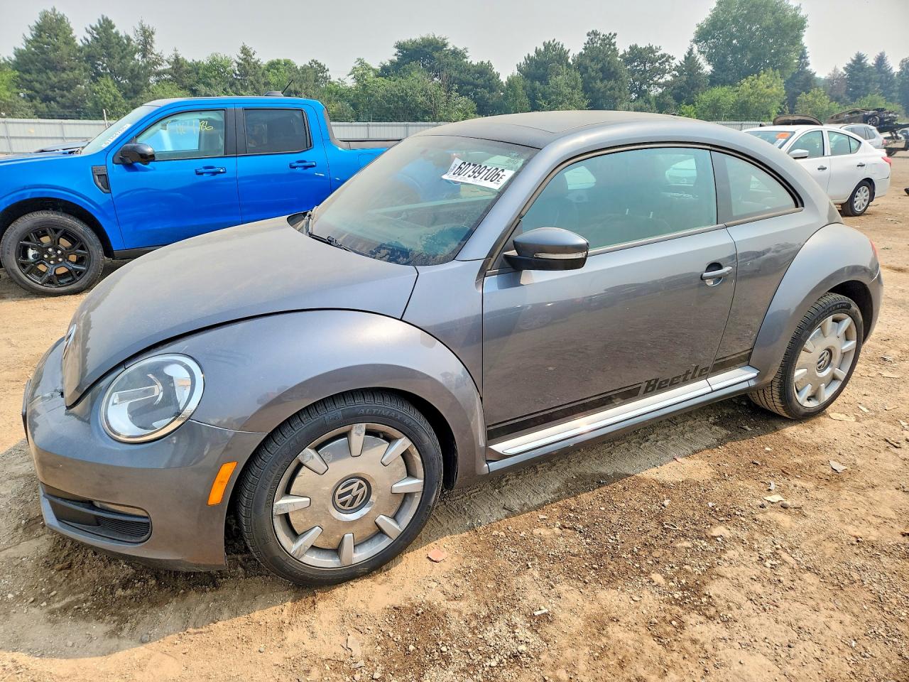2014 Volkswagen Beetle 2.5L, VIN 3VWJP7AT5EM613587 — Front end