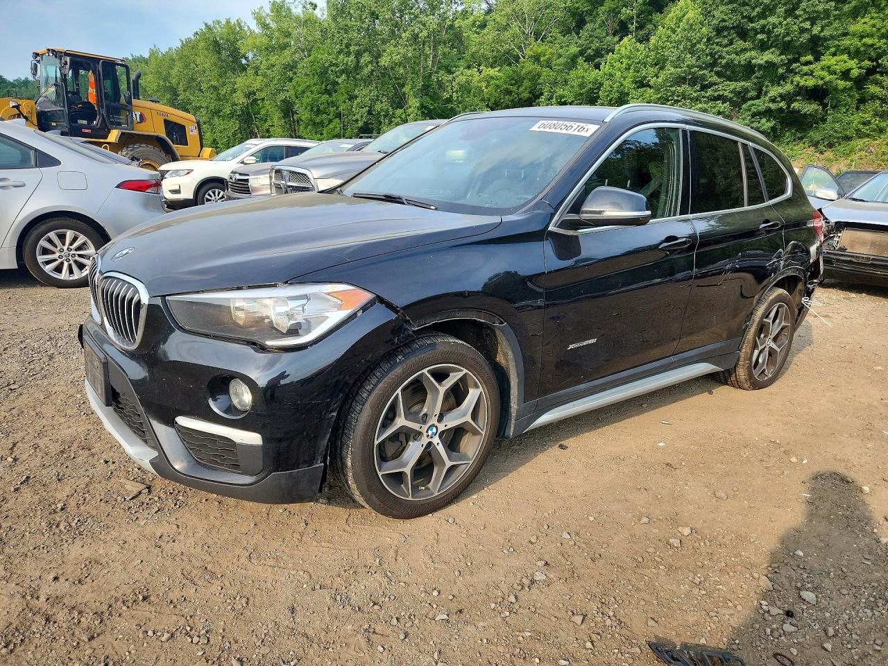 2018 BMW X1 xDrive28i, VIN WBXHT3C32J5F90813 — Rear end