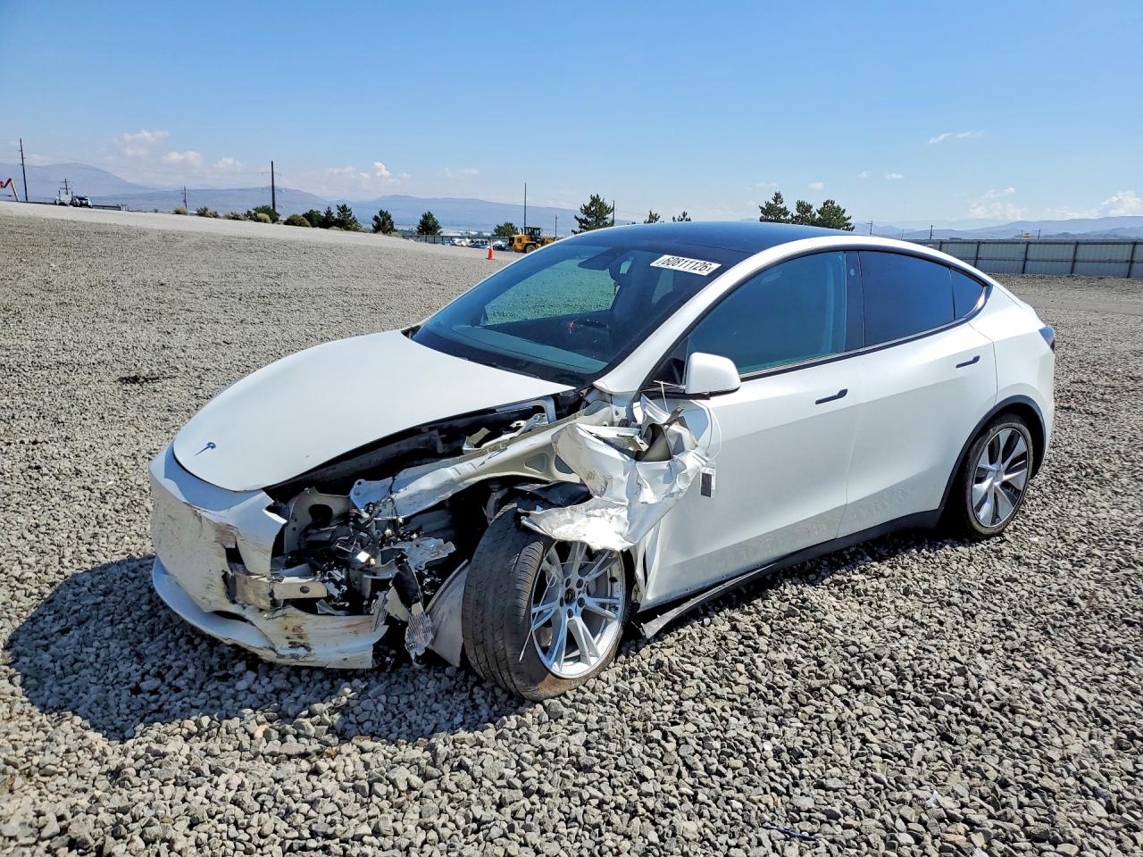 2021 Tesla Model Y Long Range, VIN 5YJYGDEE4MF207119 — Side