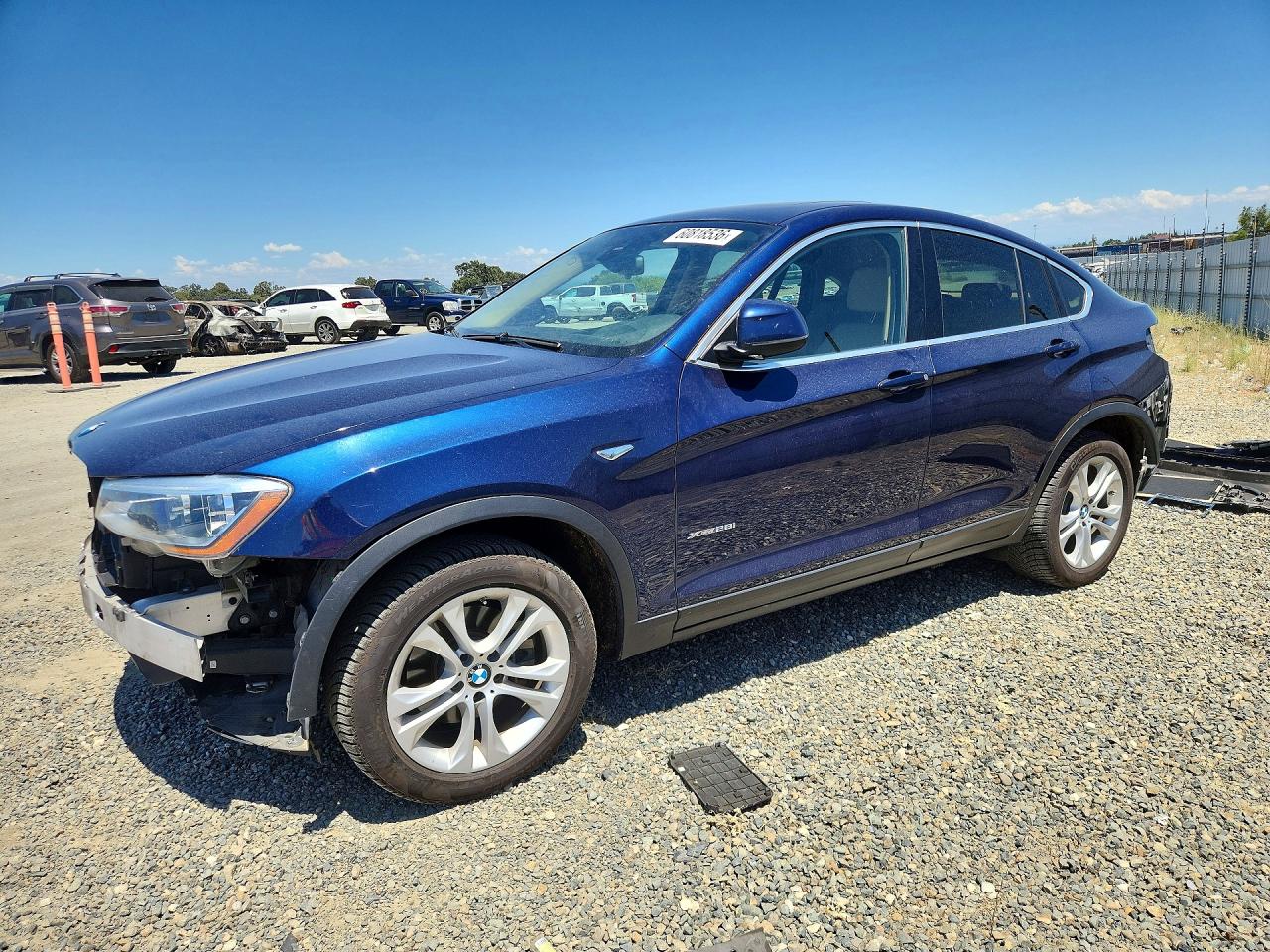 2016 BMW X4 xDrive28i, VIN 5UXXW3C54G0R22141 — Зад