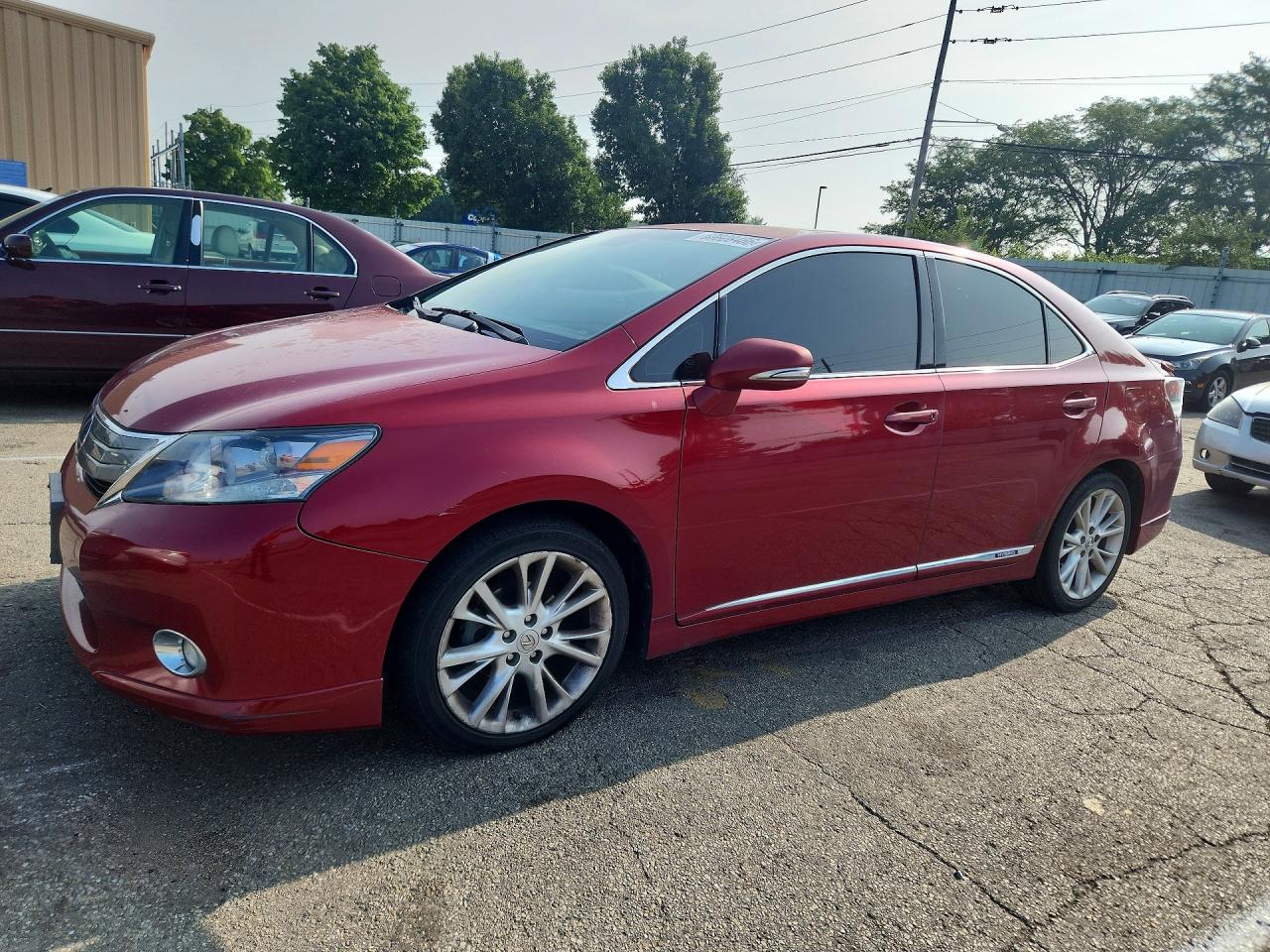 2010 Lexus HS 250h Premium, VIN JTHBB1BA8A2035324 — Side