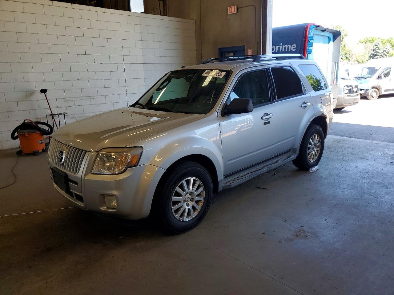 2011 Mercury Mariner Premier, VIN 4M2CN9HG6BKJ05924 — Minor dents and scratches