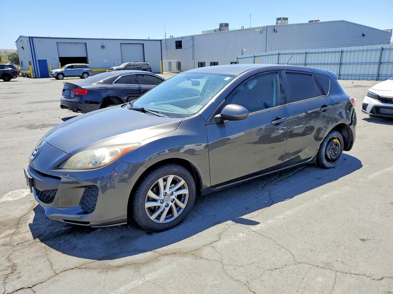 2012 Mazda 3 i Touring, VIN JM1BL1L83C1620072 — Rear end