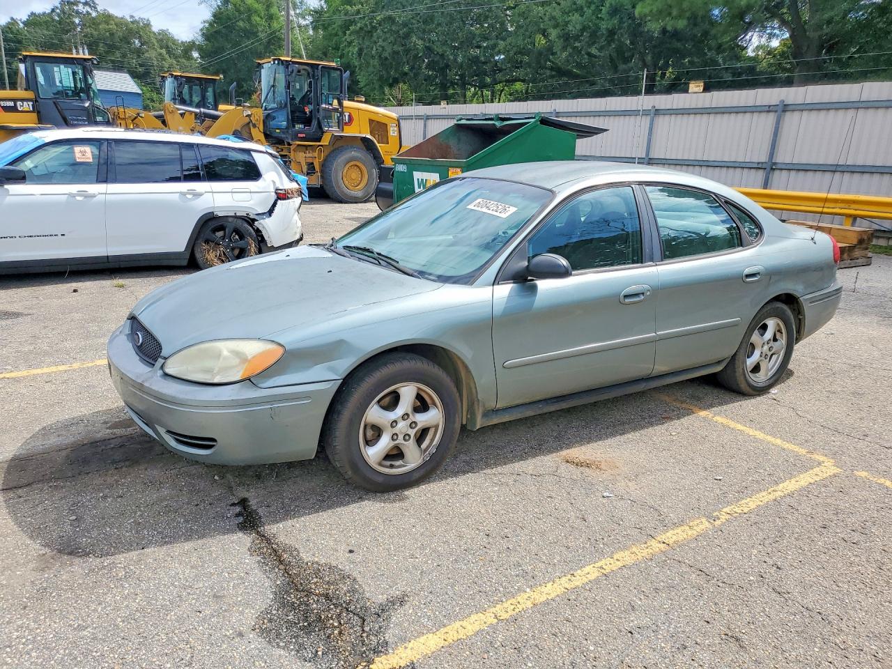 2007 Ford Taurus SE, VIN 1FAFP53U37A196205 — Side