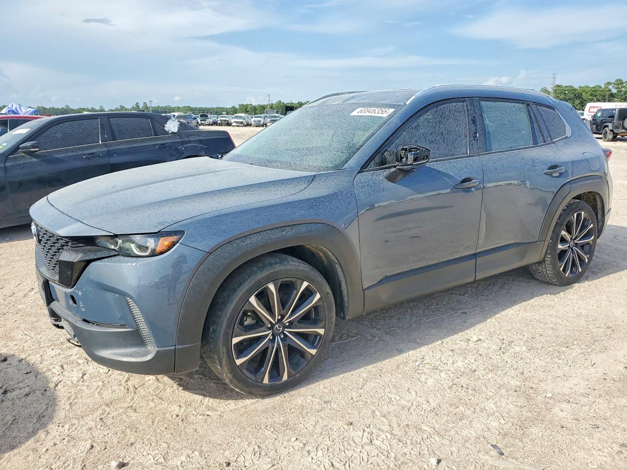 2023 Mazda CX-50 S Premium Plus, VIN 7MMVABEM8PN105618 — Water / flood