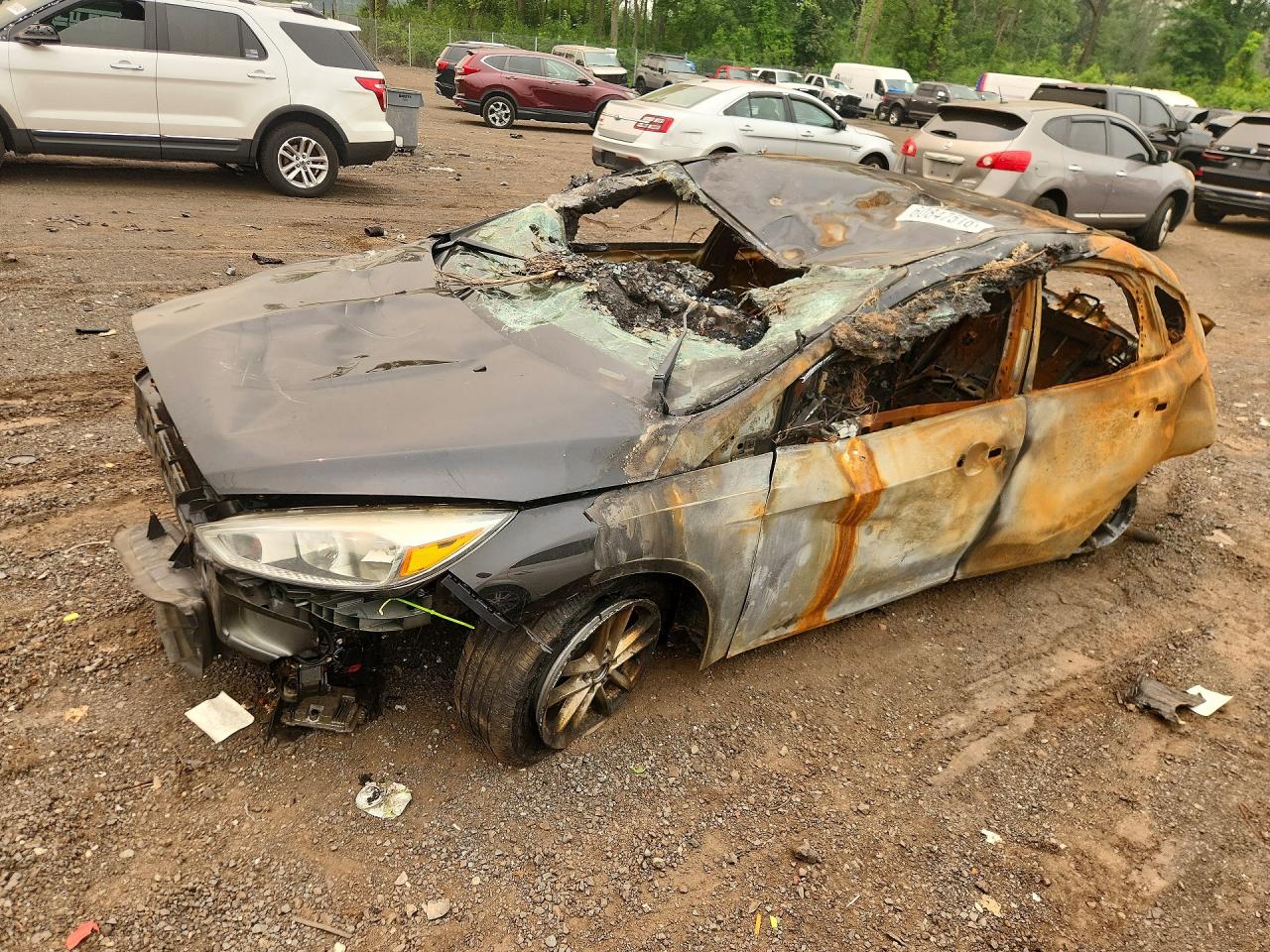 2016 Ford Focus SE, VIN 1FADP3K27GL354089 — Burn