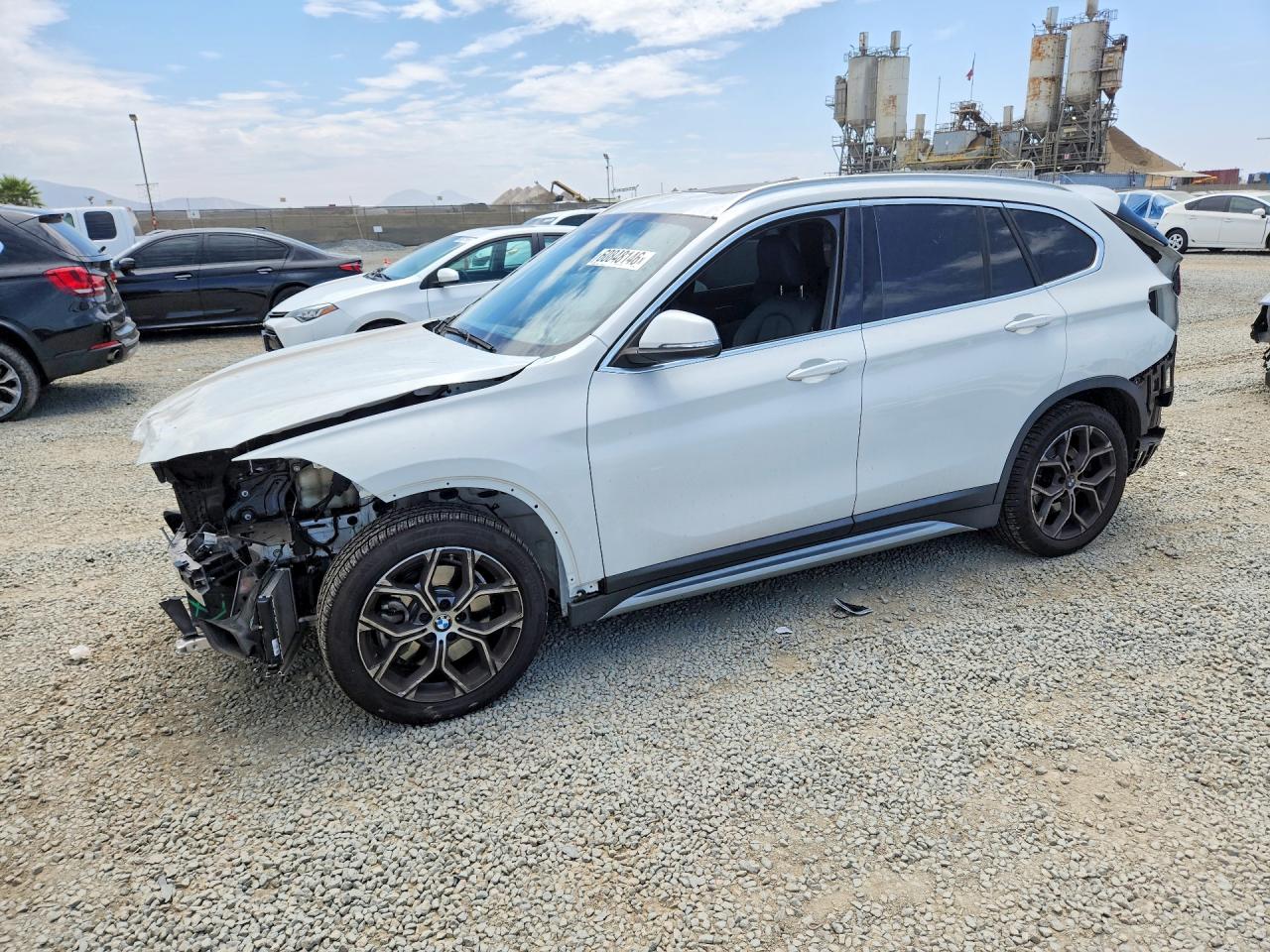 2020 BMW X1 xDrive28i, VIN WBXJG9C06L5P76594 — Rear end