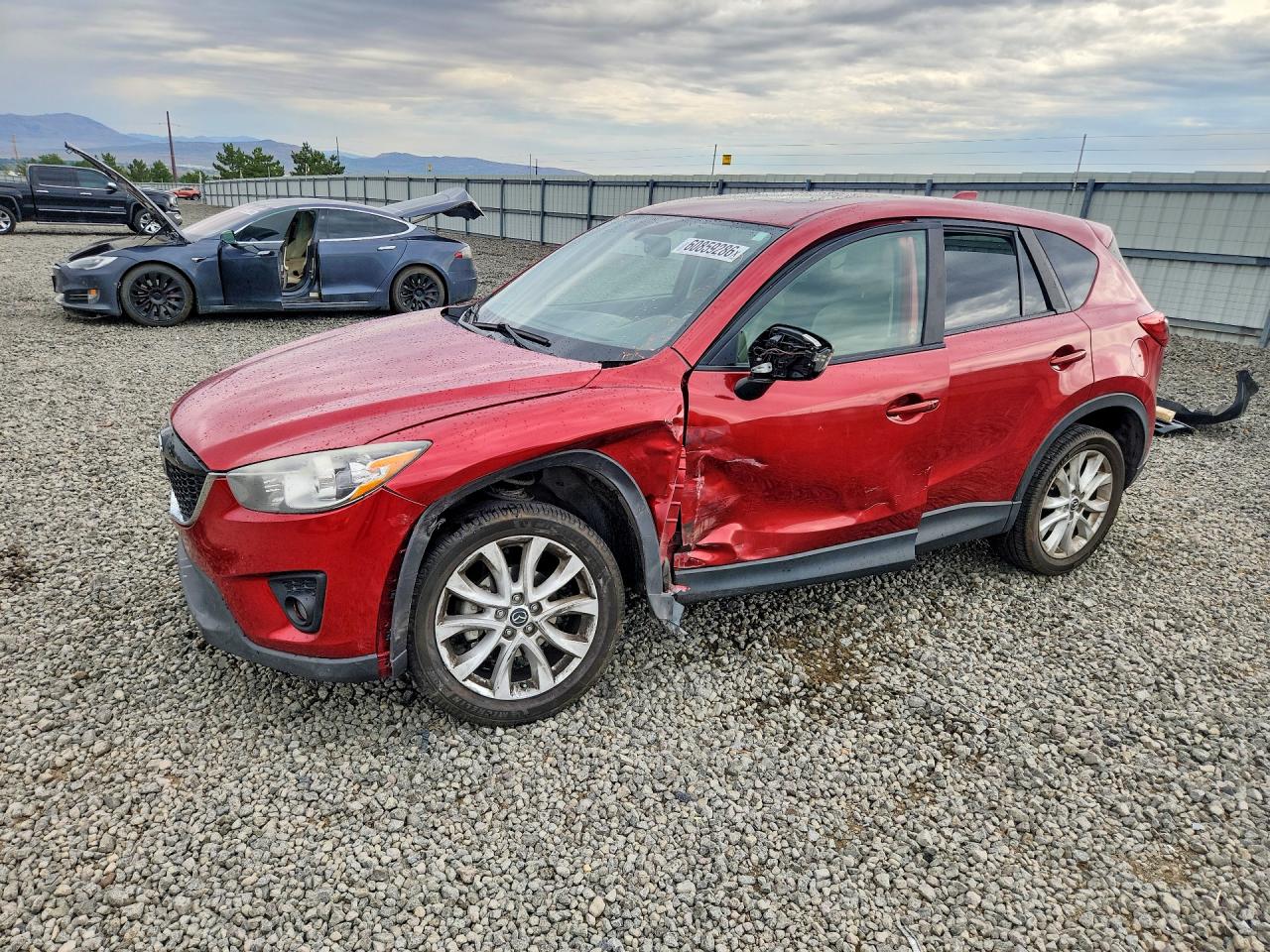 2013 Mazda CX-5 Grand Touring, VIN JM3KE4DE4D0134028 — Side