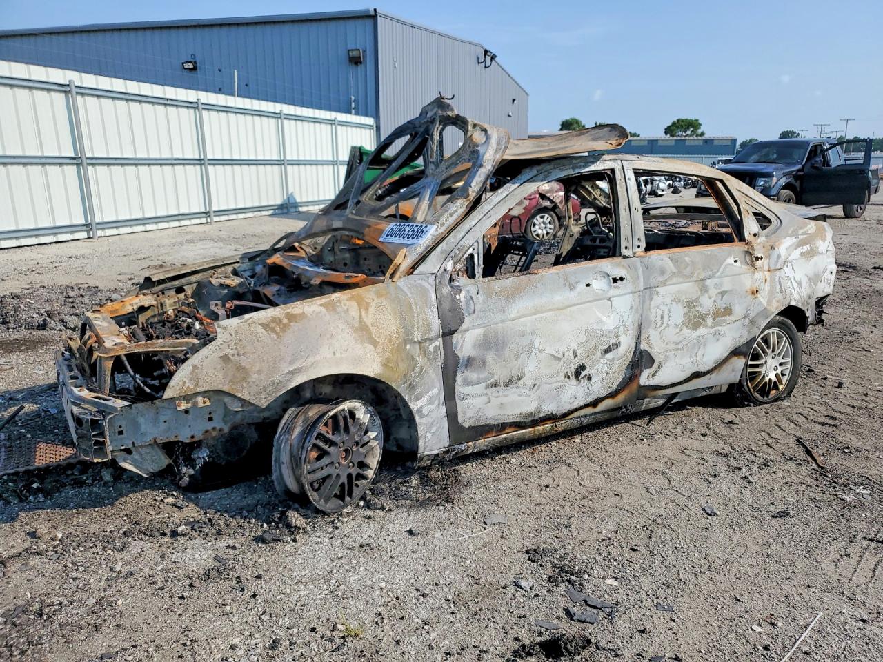 2010 Ford Focus SE, VIN 1FAHP3FN5AW284961 — Burn